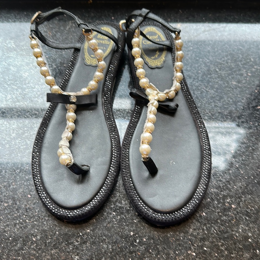 A pair of diamanté and pearl Sandler with bows